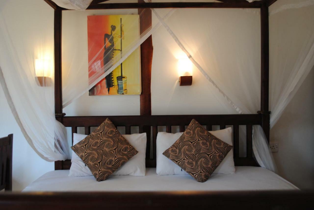 Asha Beach & Spa Тангале Екстериор снимка